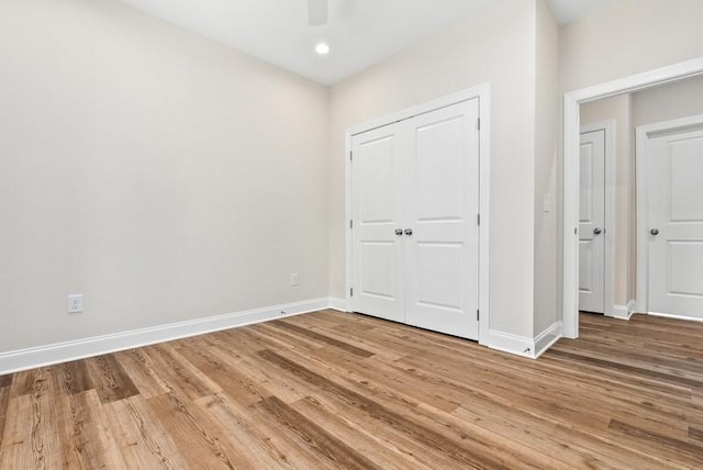 3260 Academy Dr Unit 408, Opelika, AL 36801 - unfurnished bedroom featuring light wood-type flooring, ceiling fan, recessed lighting, and a closet