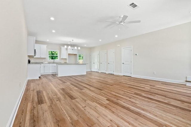 3260 Academy Dr Unit 408, Opelika, AL 36801 - unfurnished living room featuring light wood finished floors, a ceiling fan, and recessed lighting