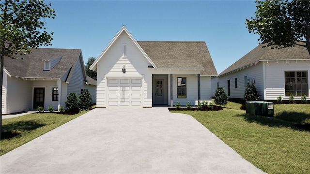 view of front facade with an attached garage, a front lawn, and driveway
