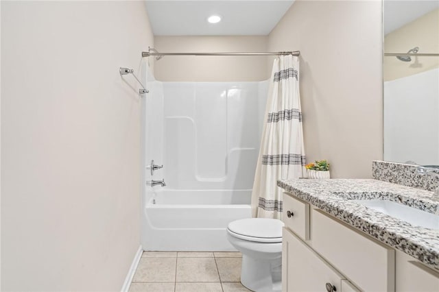 full bathroom featuring vanity, baseboards, shower / bath combo, tile patterned floors, and toilet