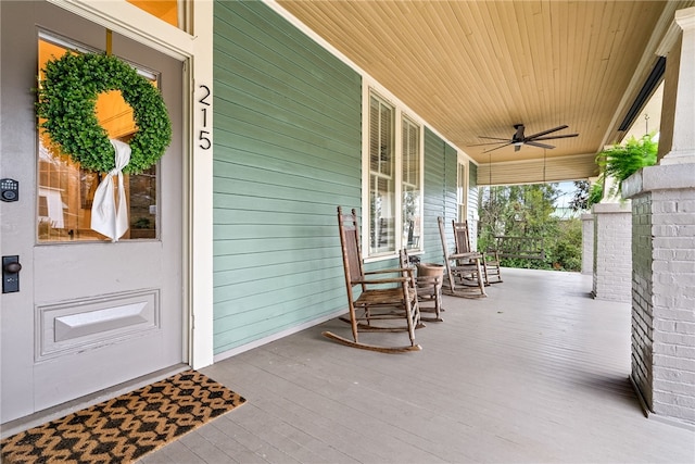 view of patio featuring a porch and a ceiling fan