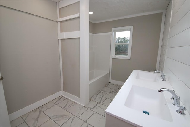 bathroom with plus walk in shower, sink, and a textured ceiling