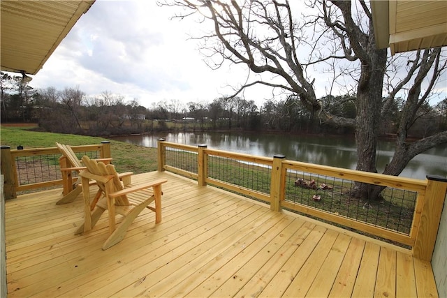 wooden terrace with a water view