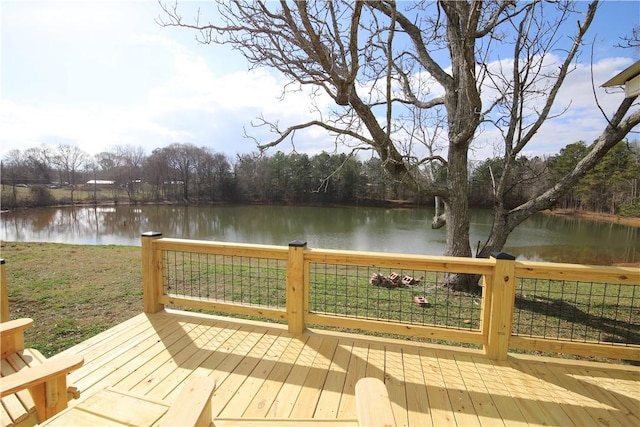 deck featuring a water view