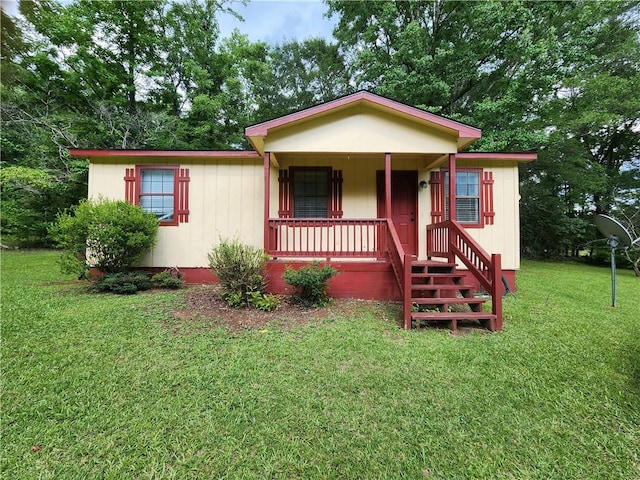 1160 Lee Road 76, Auburn, AL 36879 - manufactured / mobile home with covered porch and a front lawn