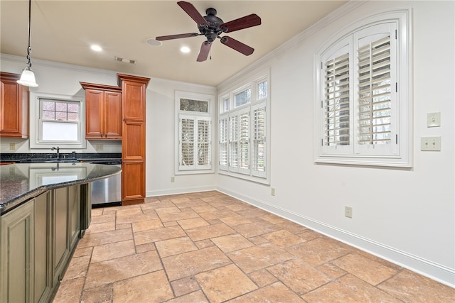 kitchen with pendant lighting, visible vents, baseboards, and dishwasher