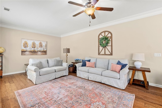 2113 Felicity Ln, Auburn, AL 36830 - living room featuring ornamental molding, a ceiling fan, baseboards, and wood finished floors