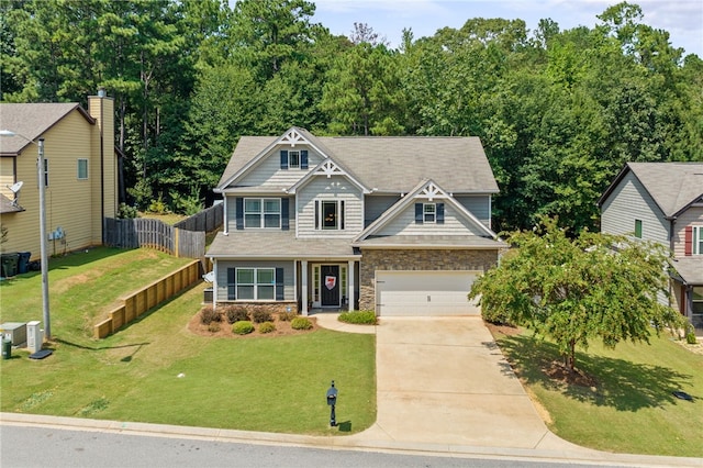 2113 Felicity Ln, Auburn, AL 36830 - craftsman-style house featuring driveway, a garage, and stone siding