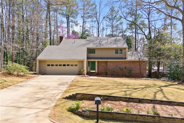 view of front of home featuring driveway, brick siding, an attached garage, and a front yard