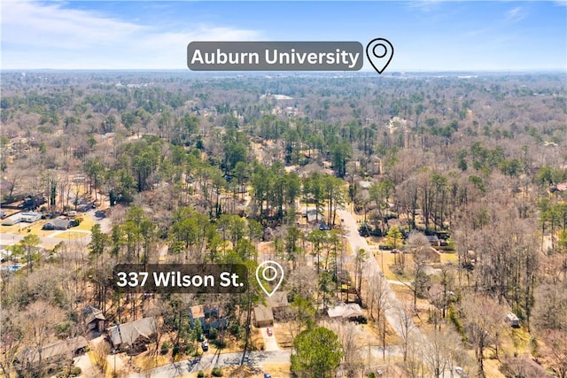 aerial view featuring a forest view