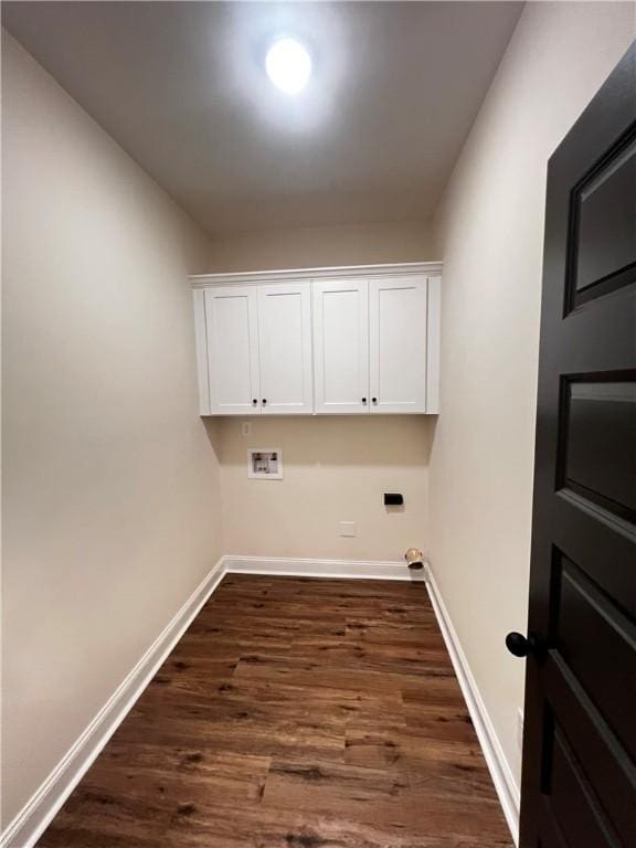 laundry room featuring baseboards, washer hookup, and dark wood finished floors