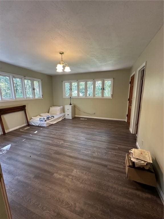 467 Southview Dr, Auburn, AL 36830 - interior space with dark hardwood / wood-style flooring, an inviting chandelier, and a wealth of natural light