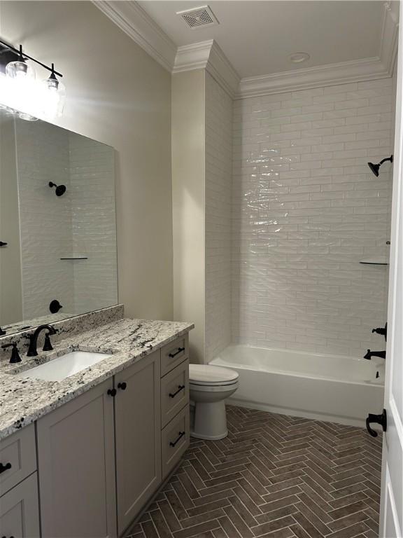 489 Windsor Dr, Opelika, AL 36801 - full bath with ornamental molding, vanity,  shower combination, and brick patterned floors