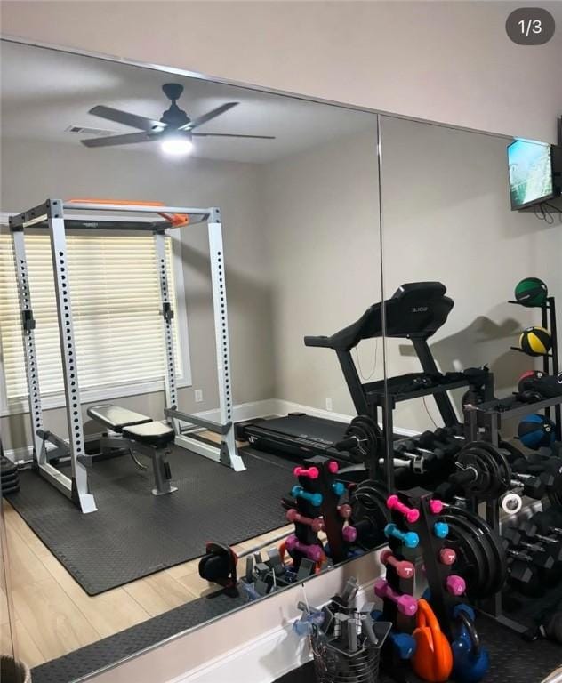 workout area featuring a ceiling fan