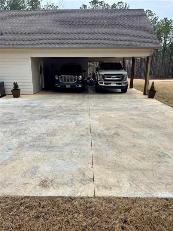 exterior space featuring driveway and a carport