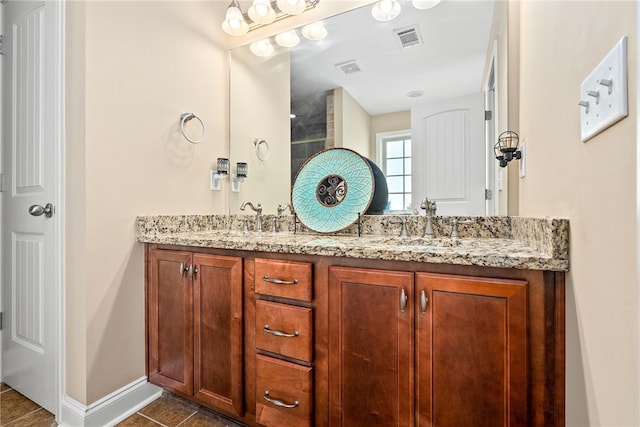 2422 Antler Ridge Dr, Auburn, AL 36832 - full bathroom with tile patterned floors, visible vents, a sink, and double vanity