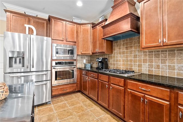 2422 Antler Ridge Dr, Auburn, AL 36832 - kitchen featuring ornamental molding, brown cabinets, custom exhaust hood, and stainless steel appliances