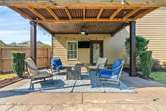 2422 Antler Ridge Dr, Auburn, AL 36832 - view of patio / terrace with a fire pit, fence, and a ceiling fan