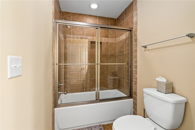 2422 Antler Ridge Dr, Auburn, AL 36832 - bathroom featuring toilet and combined bath / shower with glass door