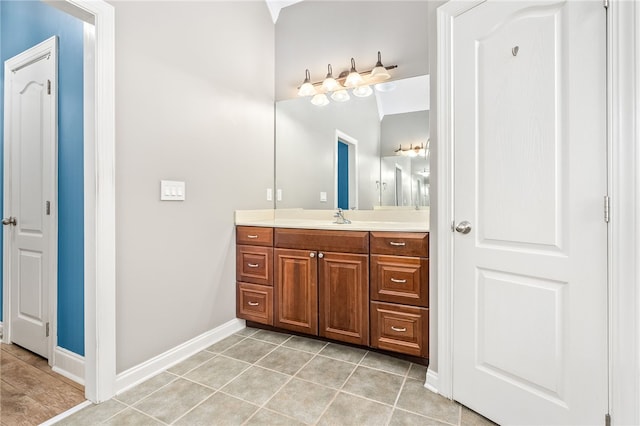 bathroom with vanity and tile patterned floors