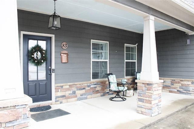 property entrance with a porch