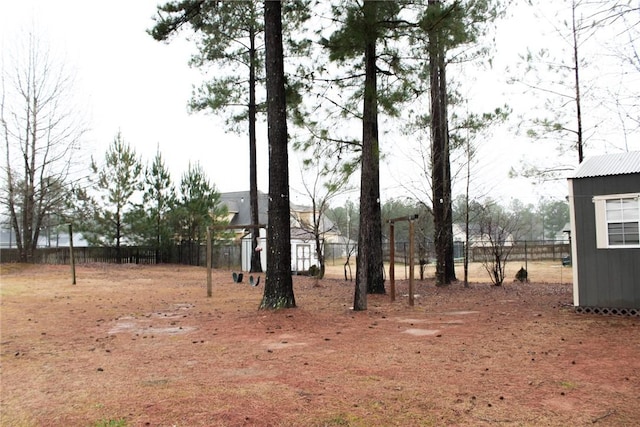 view of yard with a storage unit