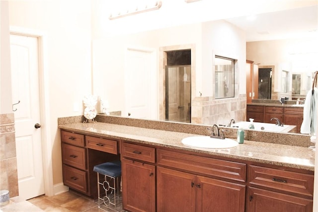 bathroom with walk in shower, tile patterned floors, and vanity