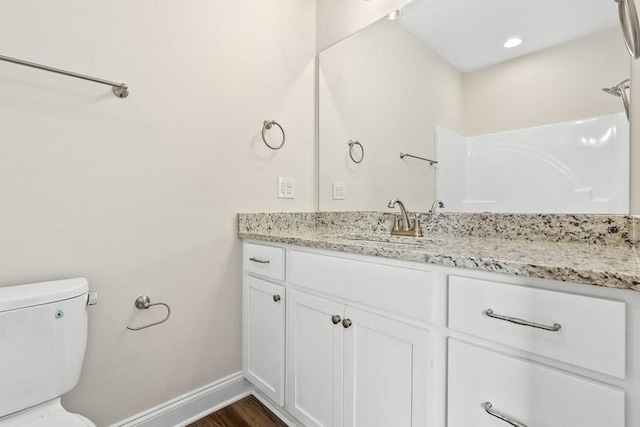 3260 Academy Dr Unit 510, Opelika, AL 36801 - bathroom with vanity, toilet, baseboards, and wood finished floors