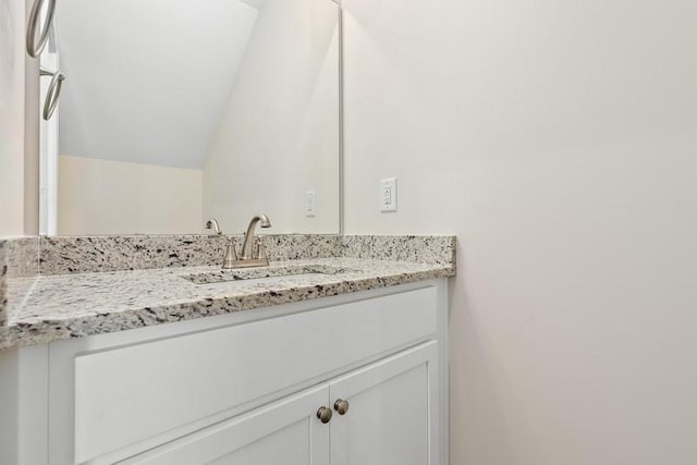 3260 Academy Dr Unit 510, Opelika, AL 36801 - bathroom featuring vanity and vaulted ceiling