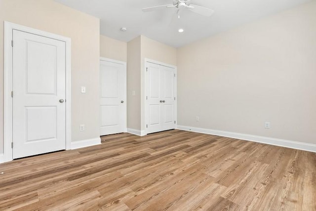 3260 Academy Dr Unit 510, Opelika, AL 36801 - unfurnished bedroom with light wood-type flooring, baseboards, a closet, a ceiling fan, and recessed lighting