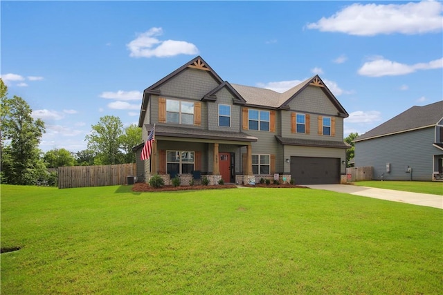 craftsman-style home with a garage and a front lawn