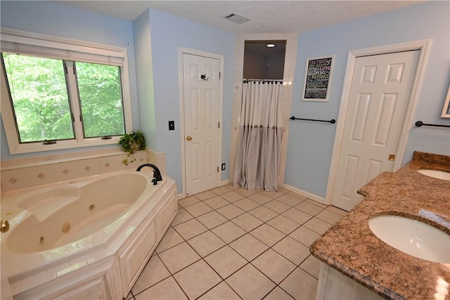 1765 Creekwood Trl, Auburn, AL 36830 - full bathroom featuring a tub with jets, tile patterned floors, curtained shower, and double vanity