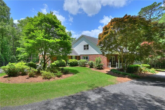 1765 Creekwood Trl, Auburn, AL 36830 - view of front of property featuring brick siding and a front lawn