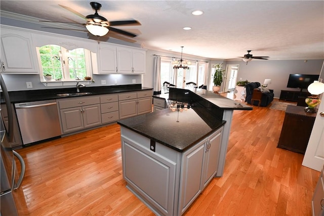 1765 Creekwood Trl, Auburn, AL 36830 - kitchen featuring dishwasher, a ceiling fan, a center island, light wood-style flooring, and recessed lighting