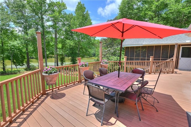 1765 Creekwood Trl, Auburn, AL 36830 - wooden deck featuring a sunroom, outdoor dining area, view of wooded area, and a water view