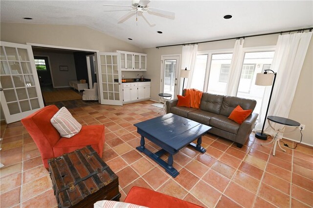 510 S Dean Rd, Auburn, AL 36830 - living room featuring vaulted ceiling, a ceiling fan, and light tile patterned floors