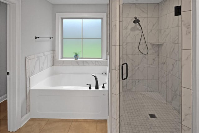 518 High Dr, Opelika, AL 36804 - full bathroom featuring a garden tub, a shower stall, and tile patterned floors