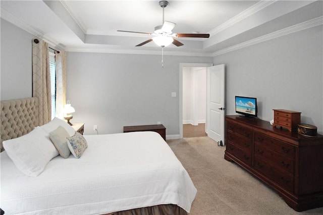 518 High Dr, Opelika, AL 36804 - bedroom featuring a raised ceiling, light colored carpet, a ceiling fan, crown molding, and baseboards