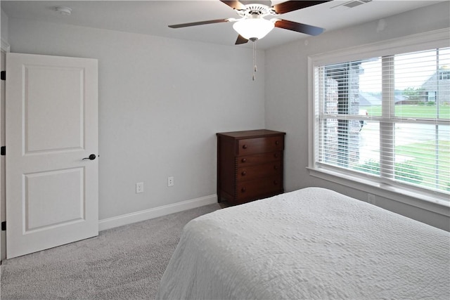 518 High Dr, Opelika, AL 36804 - bedroom featuring multiple windows, carpet flooring, baseboards, and ceiling fan