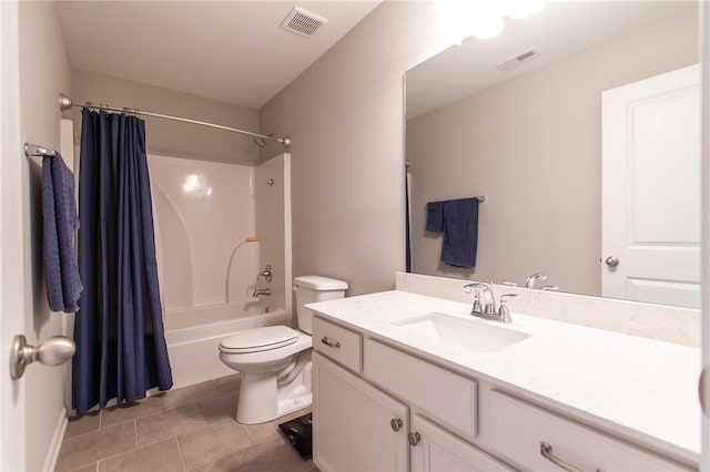 2647 Dunkirk Cir, Auburn, AL 36832 - full bath with vanity, shower / bath combo with shower curtain, toilet, and tile patterned flooring