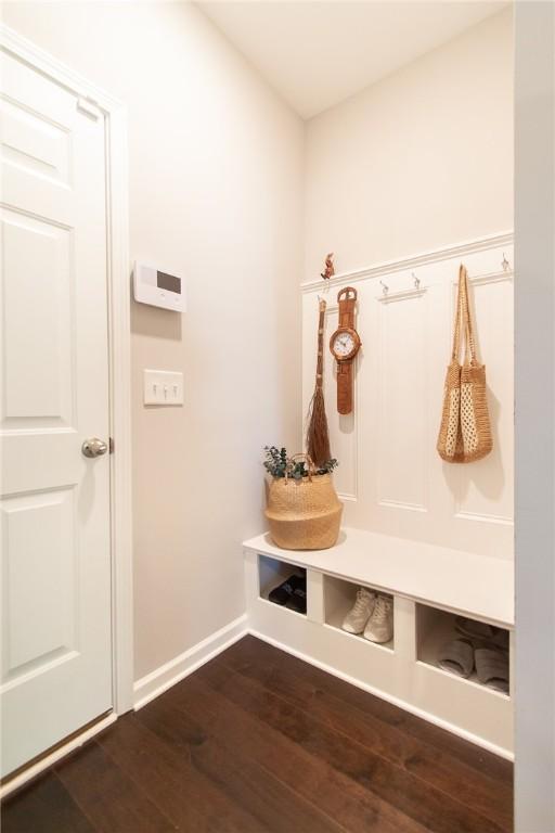 2647 Dunkirk Cir, Auburn, AL 36832 - mudroom with dark wood-type flooring and baseboards