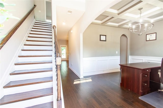 2647 Dunkirk Cir, Auburn, AL 36832 - staircase featuring arched walkways, beam ceiling, hardwood / wood-style flooring, coffered ceiling, and a chandelier