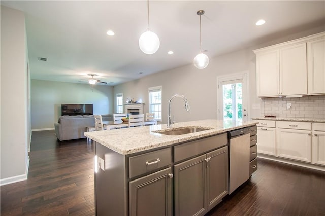 2647 Dunkirk Cir, Auburn, AL 36832 - kitchen with a sink, a kitchen island with sink, ceiling fan, open floor plan, and gray cabinets
