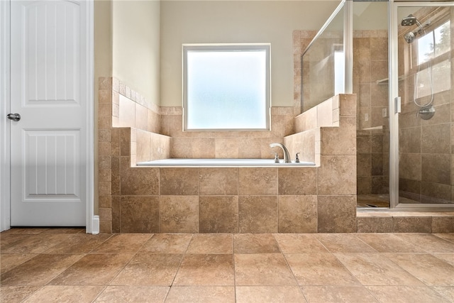 2316 Tuscany Pl, Auburn, AL 36830 - bathroom with stone tile floors, plenty of natural light, and a shower stall