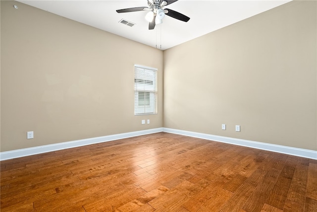 2316 Tuscany Pl, Auburn, AL 36830 - unfurnished room with baseboards, wood finished floors, visible vents, and ceiling fan