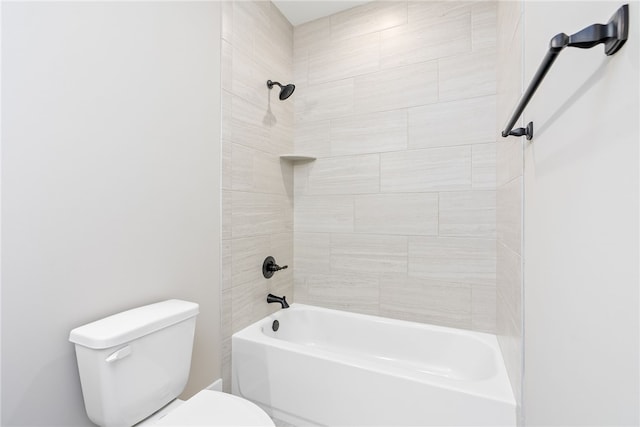 bathroom with shower / bathtub combination and toilet