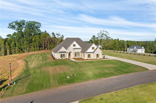 view of front of home featuring a front yard