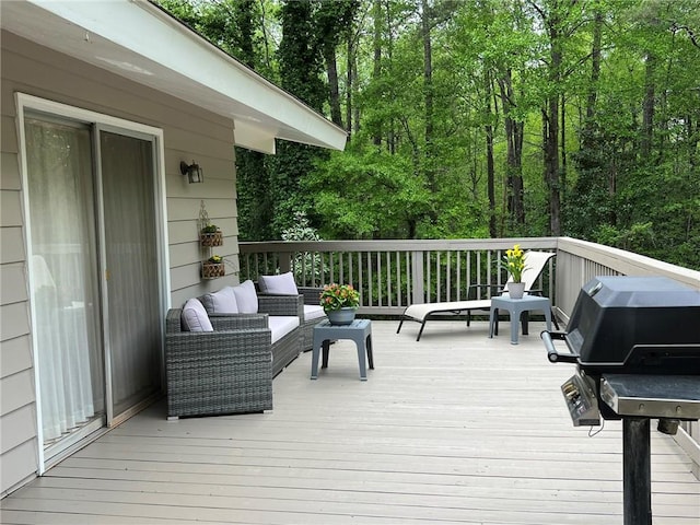 wooden terrace featuring grilling area