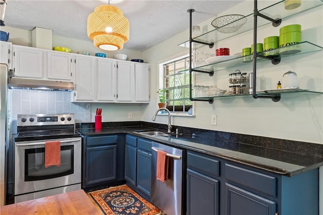 kitchen featuring open shelves, dark countertops, under cabinet range hood, a sink, and appliances with stainless steel finishes