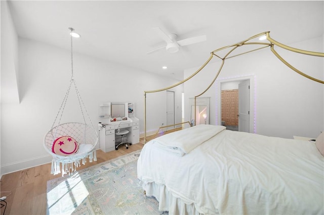 bedroom with recessed lighting, a closet, ceiling fan, wood finished floors, and baseboards